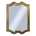 Decorative engraved gold-framed mirror on a white background