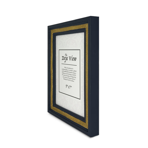 Side of handmade gilded picture frame