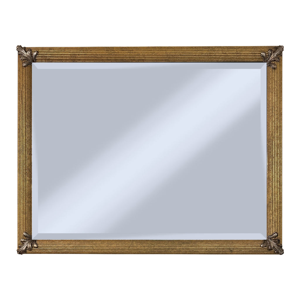 Gold-framed with hand embellished corners mirror on a white background
