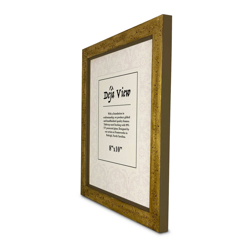 Gold picture frame with 'Deja View' text on a white background